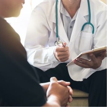 Men's health exam with doctor or psychiatrist working with patient having consultation on diagnostic examination on male disease or mental illness in medical clinic or hospital mental health service